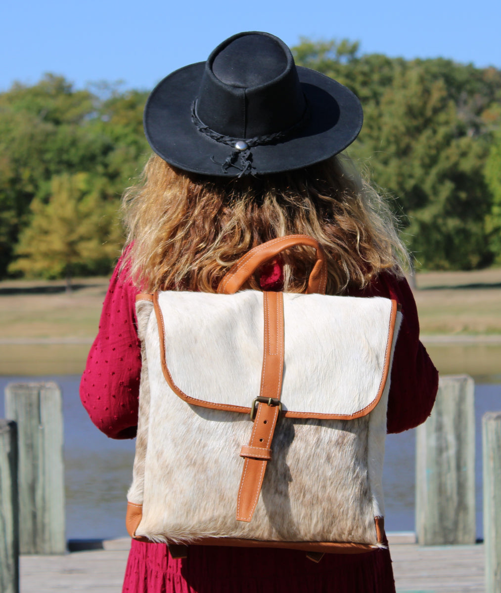 Hair on cowhide on sale backpack